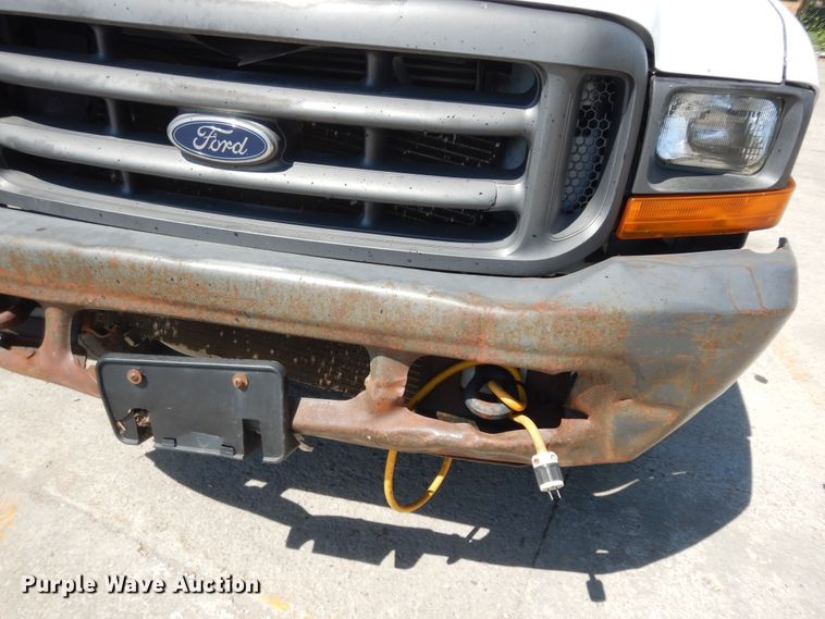 image for item MD9242 1999 Ford F450 Super Duty  dump flatbed truck