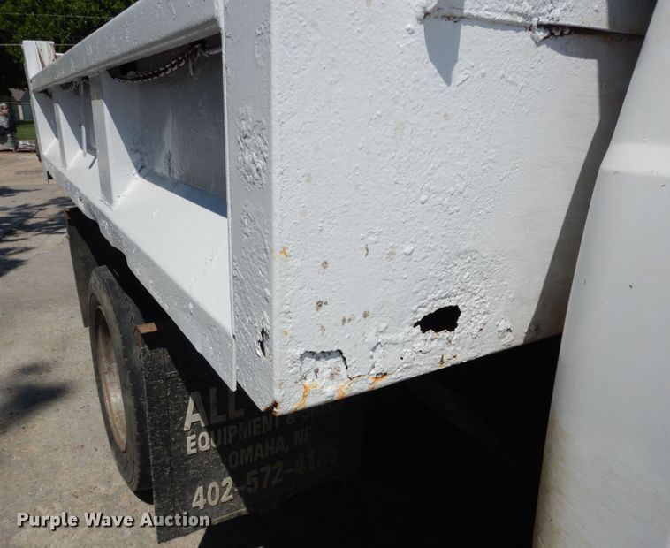 image for item MD9242 1999 Ford F450 Super Duty  dump flatbed truck