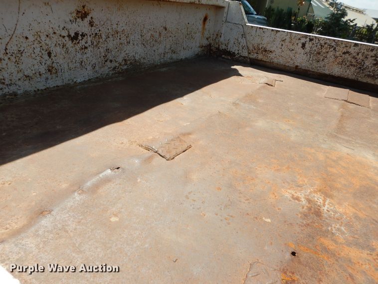 image for item MD9242 1999 Ford F450 Super Duty  dump flatbed truck