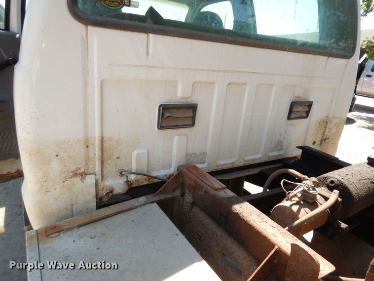 image for item MD9242 1999 Ford F450 Super Duty  dump flatbed truck