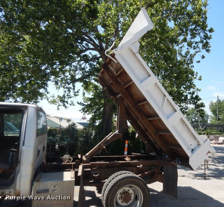 image for item MD9242 1999 Ford F450 Super Duty  dump flatbed truck