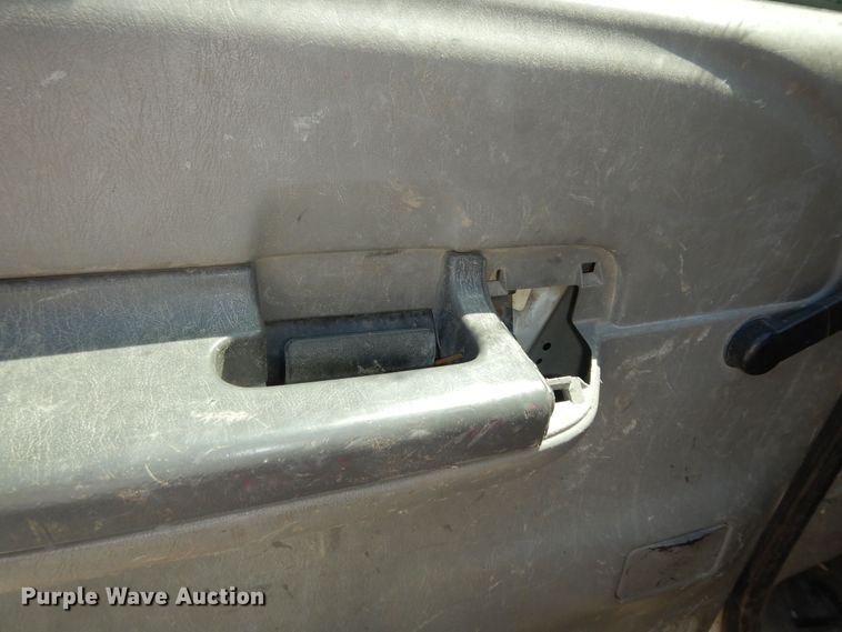 image for item MD9242 1999 Ford F450 Super Duty  dump flatbed truck