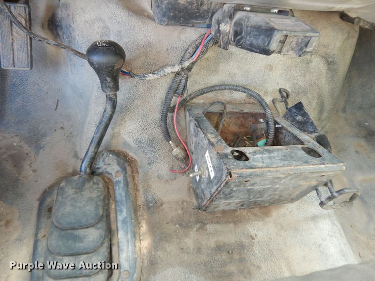 image for item MD9242 1999 Ford F450 Super Duty  dump flatbed truck