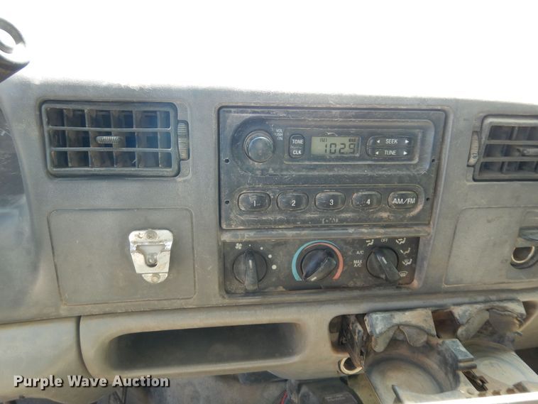 image for item MD9242 1999 Ford F450 Super Duty  dump flatbed truck