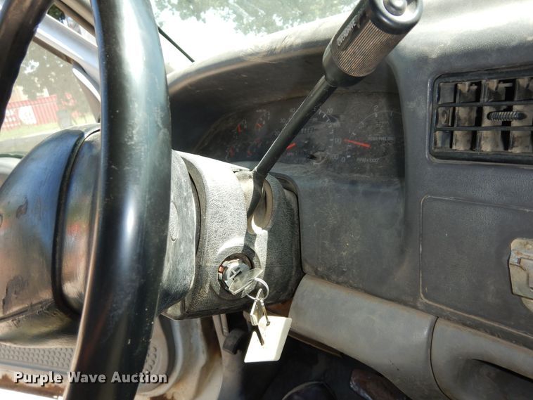 image for item MD9242 1999 Ford F450 Super Duty  dump flatbed truck