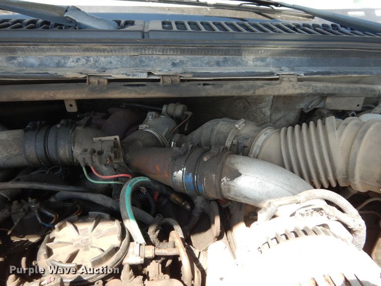 image for item MD9242 1999 Ford F450 Super Duty  dump flatbed truck