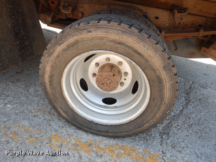 image for item MD9242 1999 Ford F450 Super Duty  dump flatbed truck