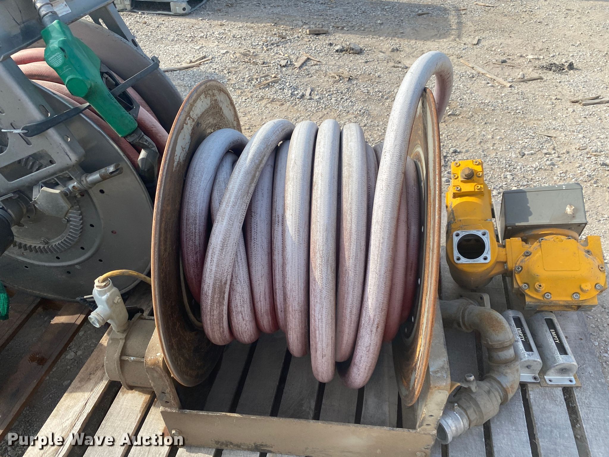 (3) hose reels in Tulsa, OK Item JA9252 sold Purple Wave