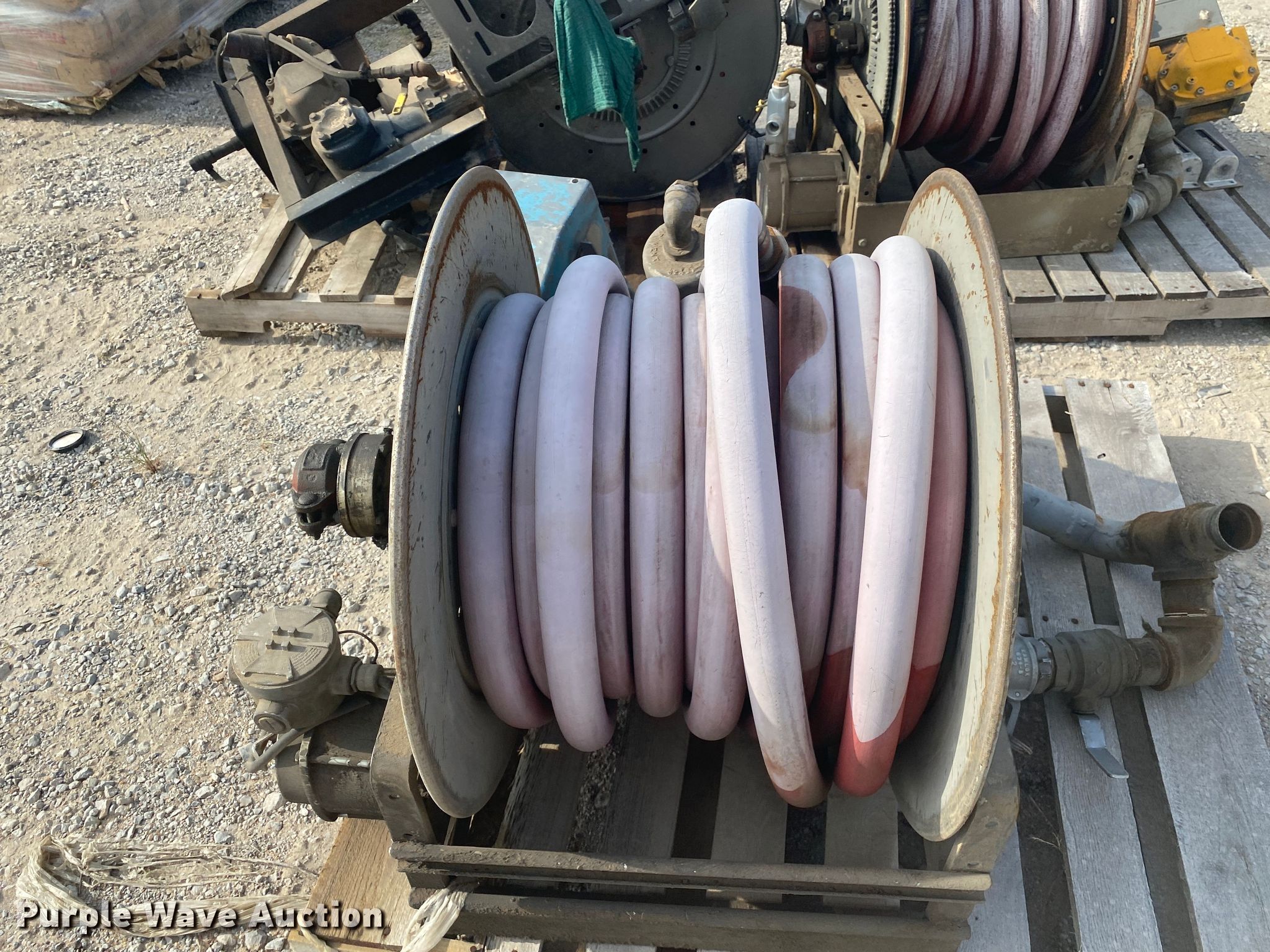 (3) hose reels in Tulsa, OK Item JA9252 sold Purple Wave