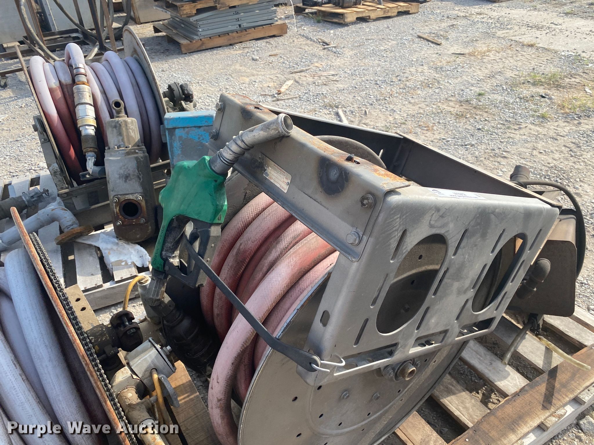 (3) hose reels in Tulsa, OK Item JA9252 sold Purple Wave