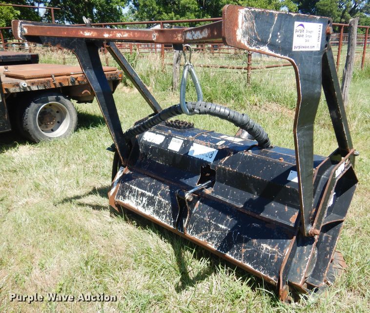 image for item DN0434 Caterpillar HM315  skid steer mulcher