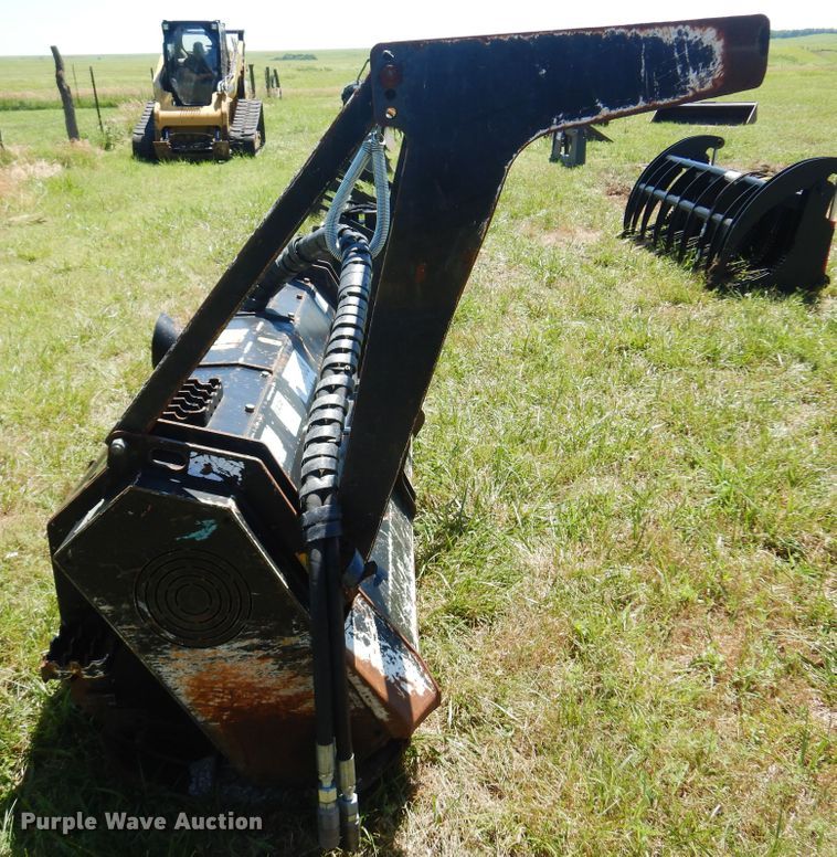 image for item DN0434 Caterpillar HM315  skid steer mulcher