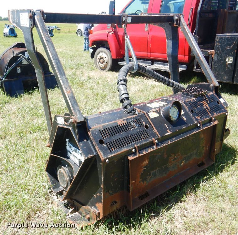 image for item DN0434 Caterpillar HM315  skid steer mulcher