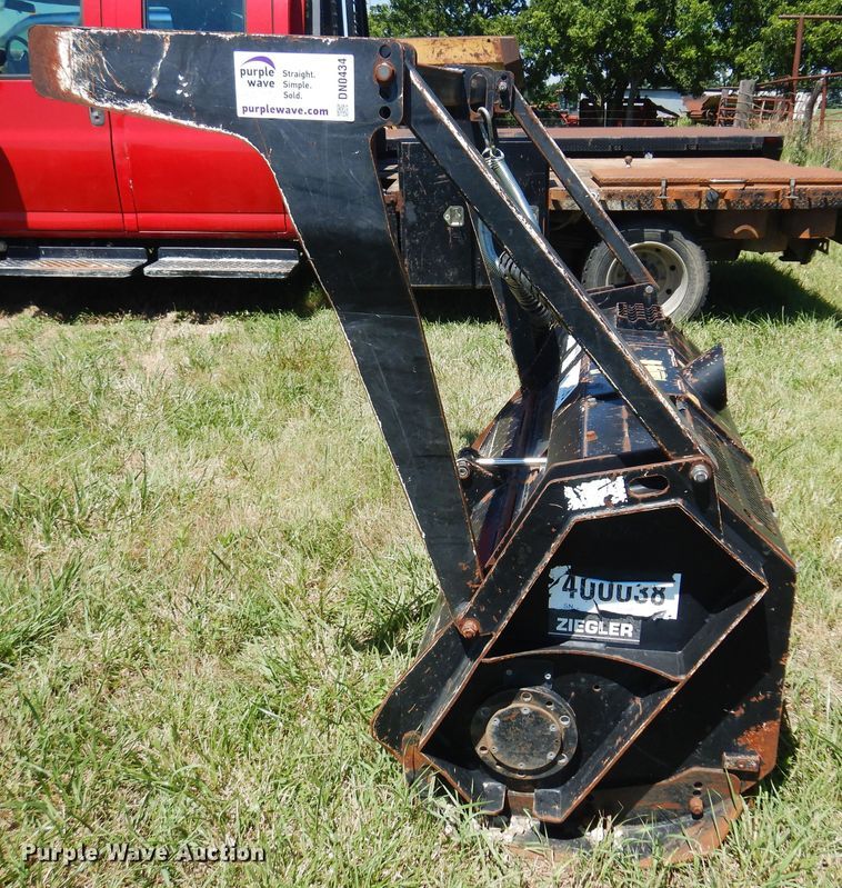 image for item DN0434 Caterpillar HM315  skid steer mulcher