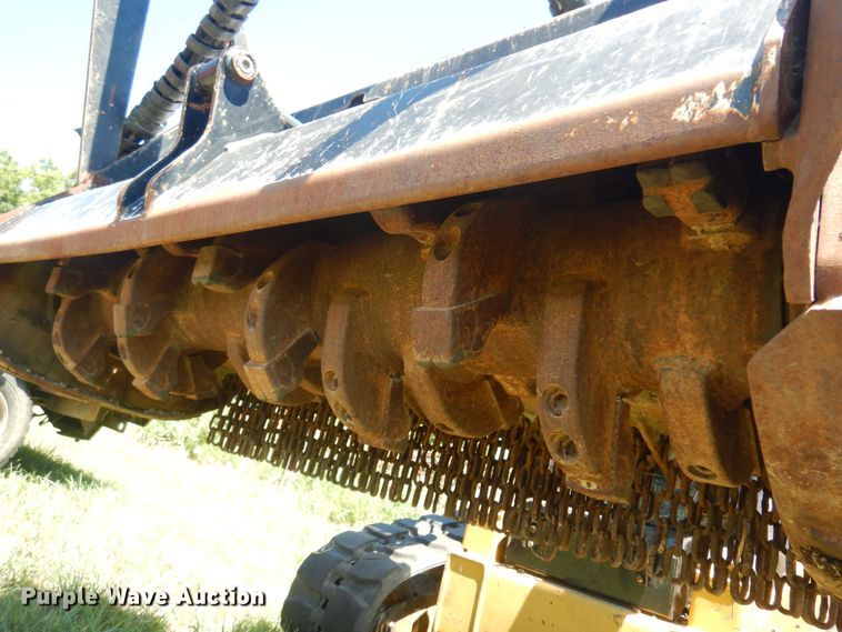 image for item DN0434 Caterpillar HM315  skid steer mulcher