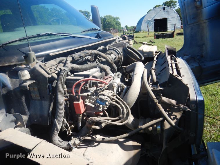 image for item DN0437 2004 GMC C4500  flatbed truck