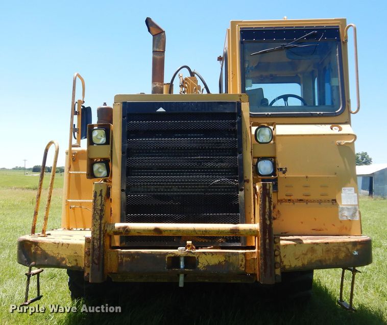 image for item DN0438 1999 Caterpillar 621F  conventional scraper