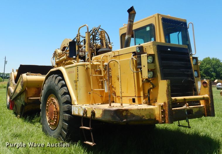 image for item DN0438 1999 Caterpillar 621F  conventional scraper