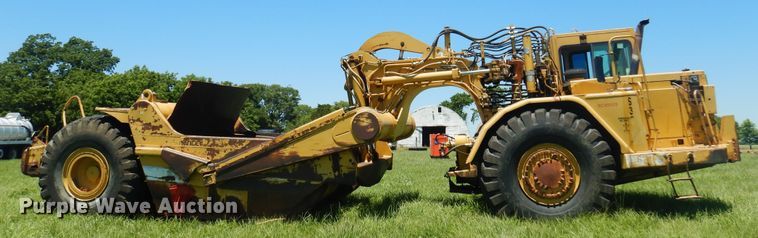 image for item DN0438 1999 Caterpillar 621F  conventional scraper