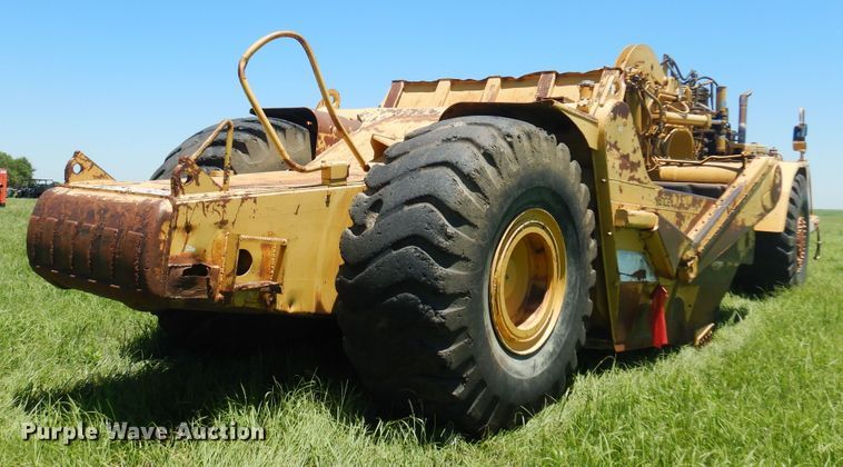 image for item DN0438 1999 Caterpillar 621F  conventional scraper