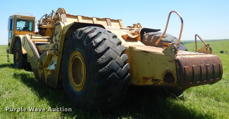image for item DN0438 1999 Caterpillar 621F  conventional scraper
