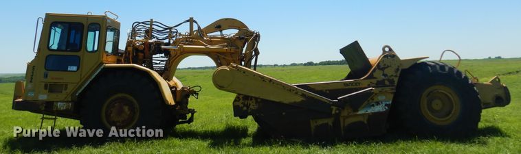 image for item DN0438 1999 Caterpillar 621F  conventional scraper