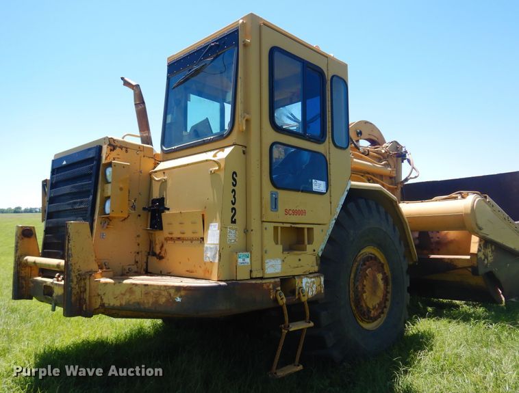 image for item DN0438 1999 Caterpillar 621F  conventional scraper