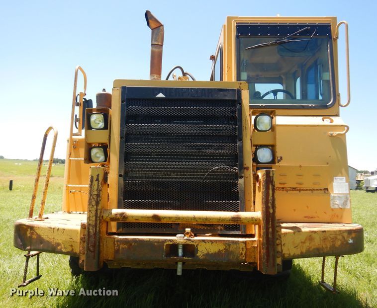 image for item DN0438 1999 Caterpillar 621F  conventional scraper