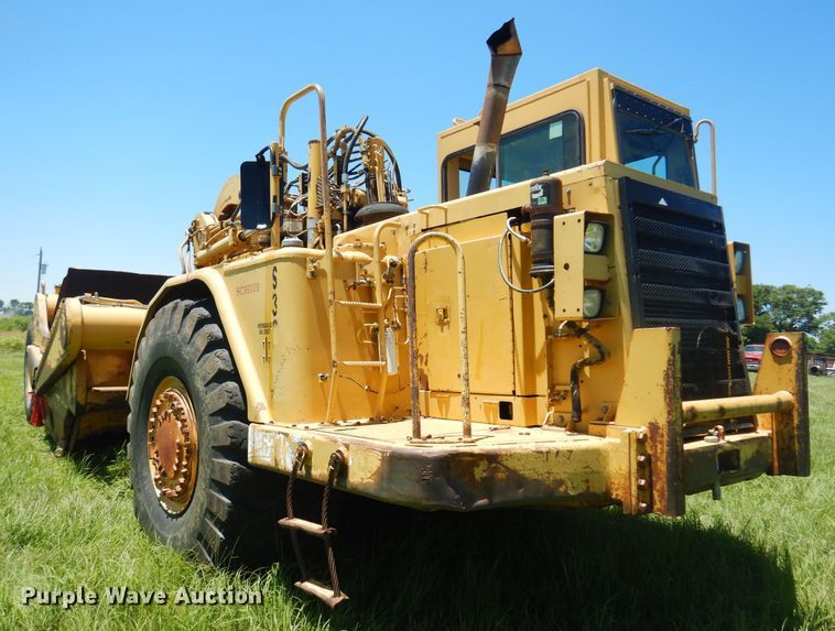 image for item DN0438 1999 Caterpillar 621F  conventional scraper