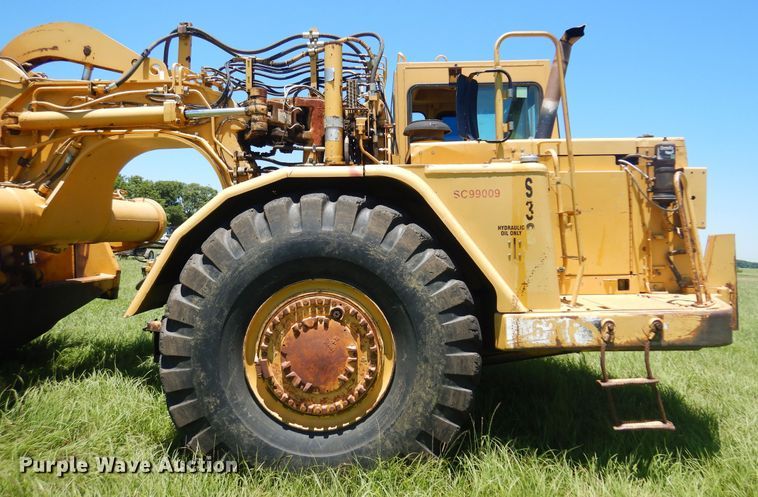 image for item DN0438 1999 Caterpillar 621F  conventional scraper