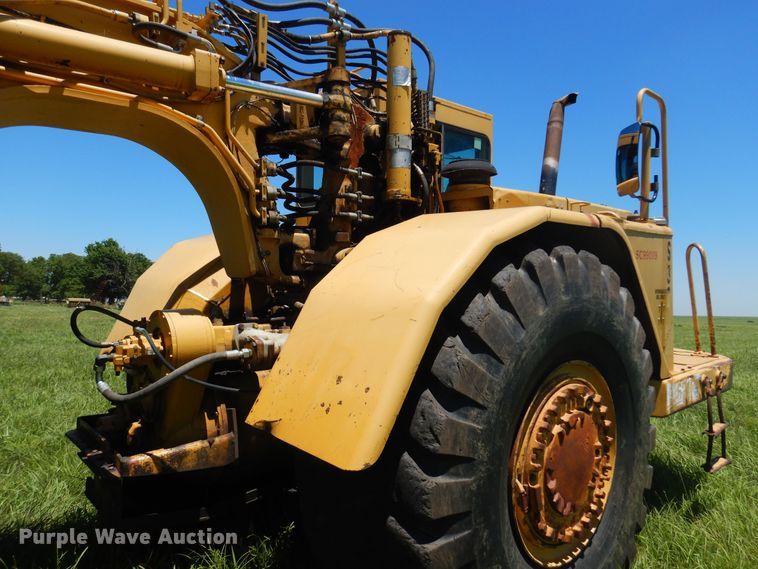 image for item DN0438 1999 Caterpillar 621F  conventional scraper