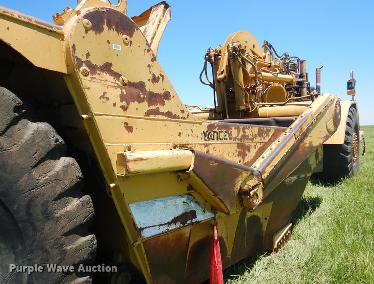 image for item DN0438 1999 Caterpillar 621F  conventional scraper