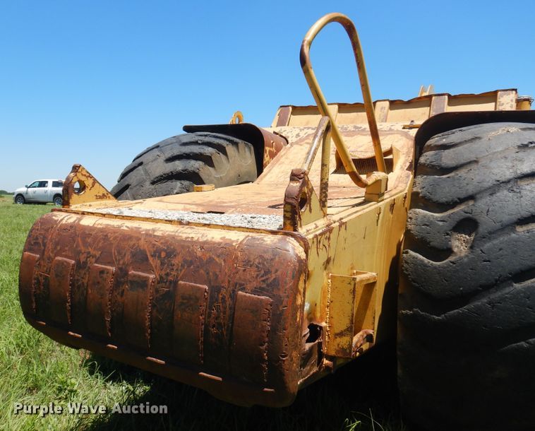 image for item DN0438 1999 Caterpillar 621F  conventional scraper