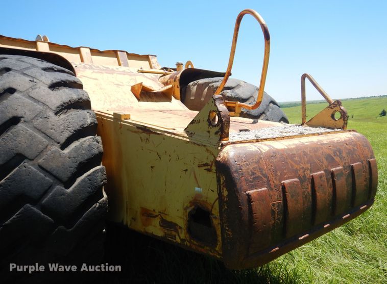 image for item DN0438 1999 Caterpillar 621F  conventional scraper