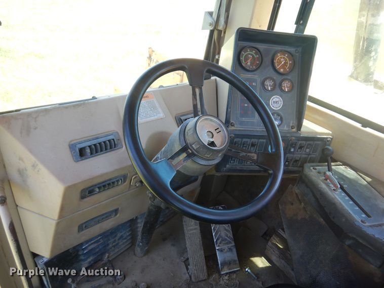 image for item DN0438 1999 Caterpillar 621F  conventional scraper