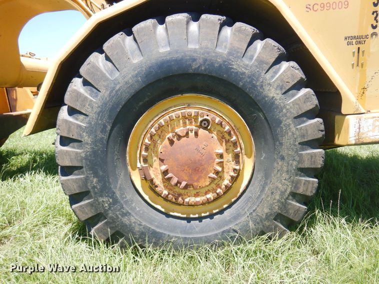 image for item DN0438 1999 Caterpillar 621F  conventional scraper