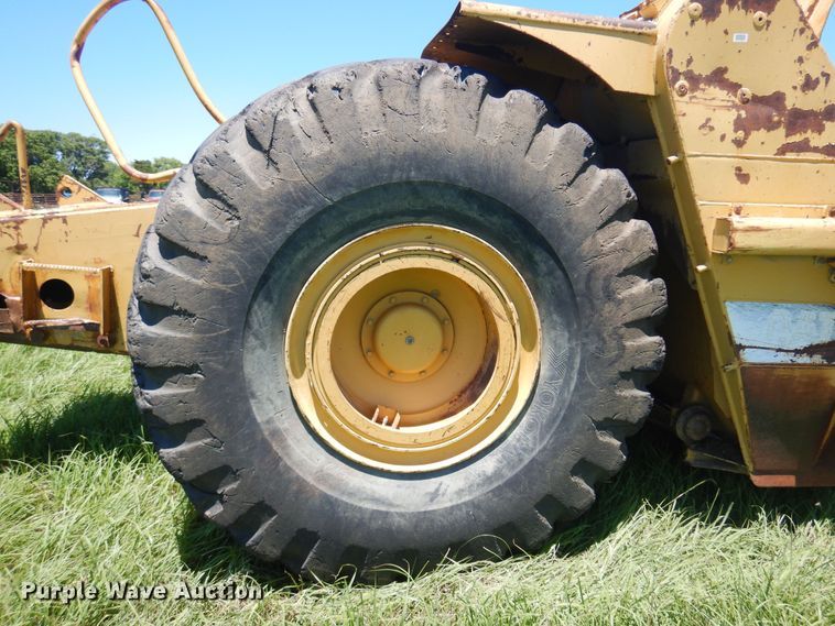 image for item DN0438 1999 Caterpillar 621F  conventional scraper