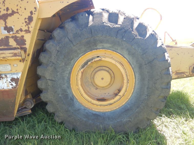 image for item DN0438 1999 Caterpillar 621F  conventional scraper