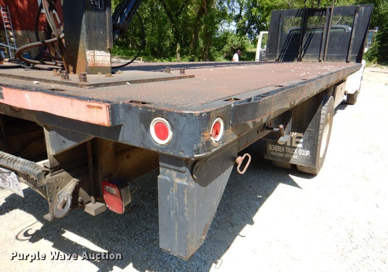 image for item DP4306 1992 Ford F700  flatbed truck