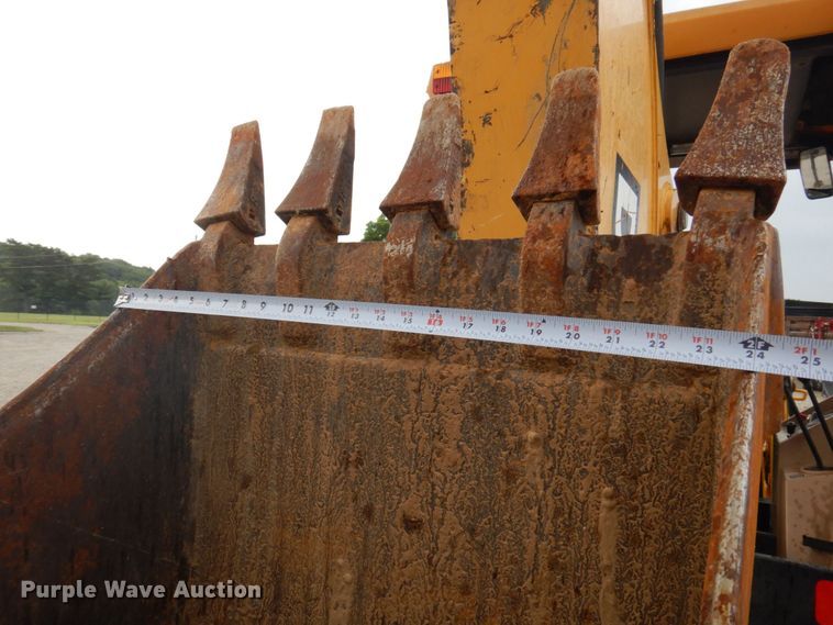 image for item DP5589 2000 John Deere 310E  backhoe