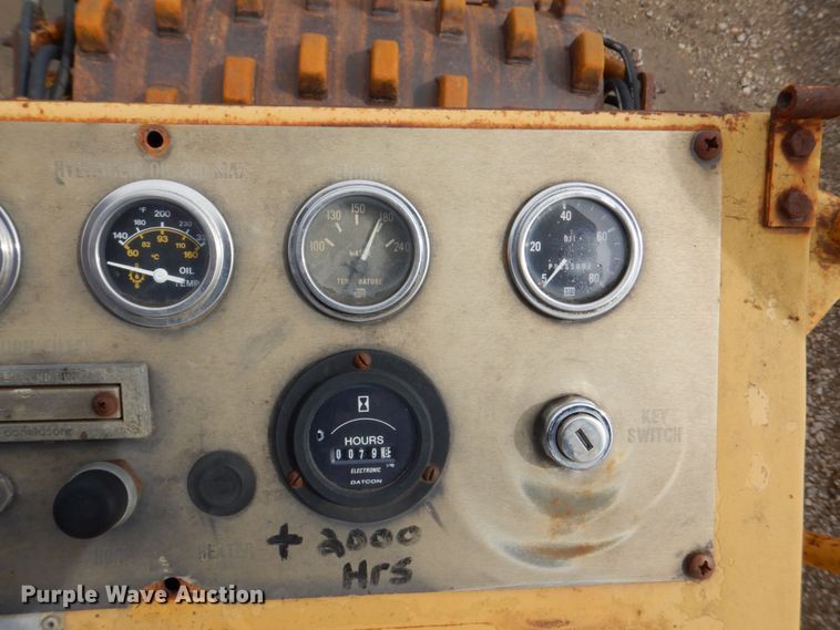 image for item DS8080 1987 Caterpillar CP-323  single drum vibratory roller