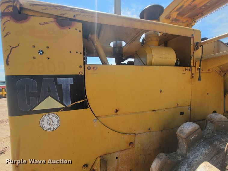 image for item JG9818 1975 Caterpillar 814  soil compactor