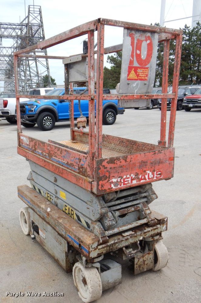 image for item KR9236 1997 Skyjack SJIII 3219  scissor lift