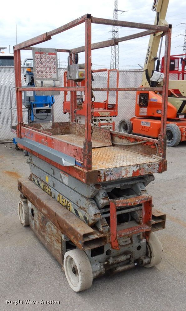 image for item KR9236 1997 Skyjack SJIII 3219  scissor lift