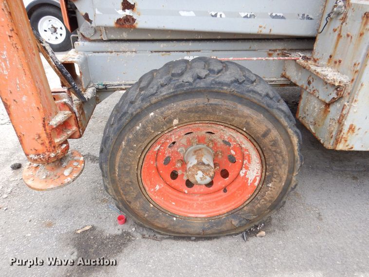 image for item KR9239 2004 Skyjack SJ8831  scissor lift