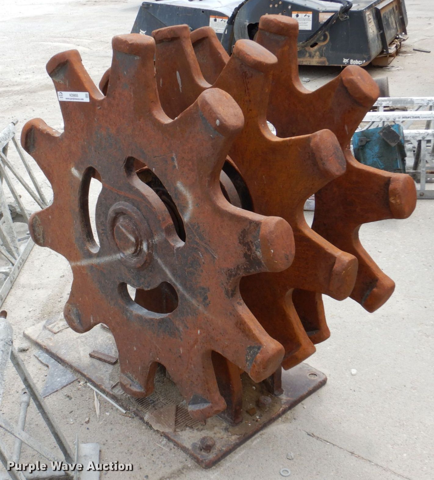Backhoe compaction wheel in Lincoln, NE Item KD9855 sold Purple Wave