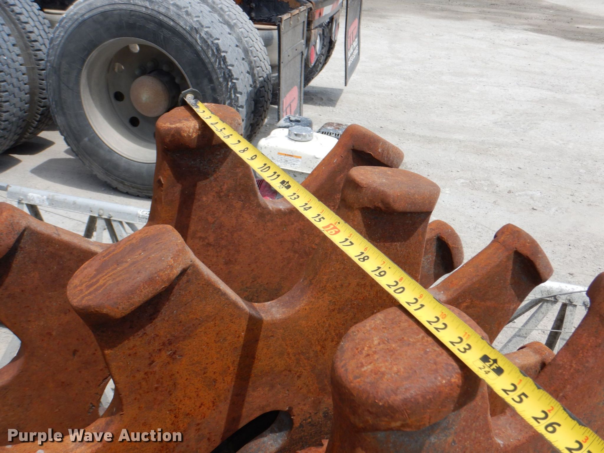 Backhoe compaction wheel in Lincoln, NE Item KD9855 sold Purple Wave