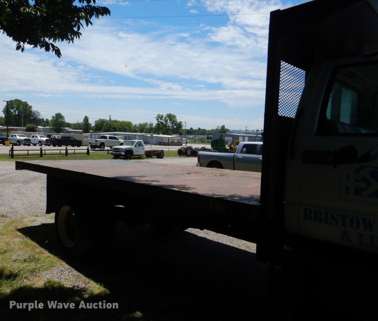 image for item KJ9807 1998 Chevrolet C6500  dump flatbed truck