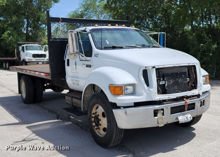 image for item JA9879 2004 Ford F650 Super Duty  dump flatbed truck