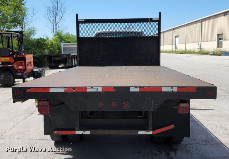 image for item JA9879 2004 Ford F650 Super Duty  dump flatbed truck
